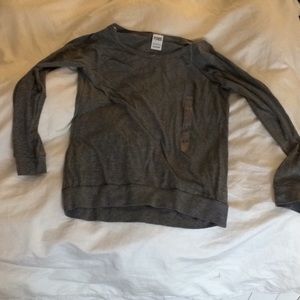 Victoria’s Secret pink shirt.